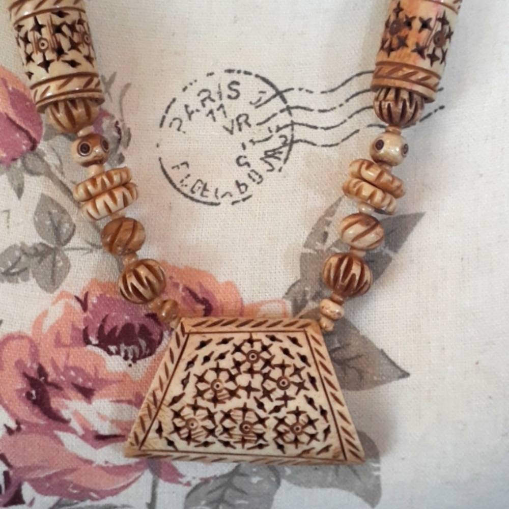 # Vintage South Pacific carved wood/bone Necklace
